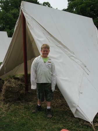 Sawyer at his tent at Camp Flintlock