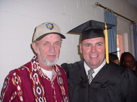 Dad and son at graduation