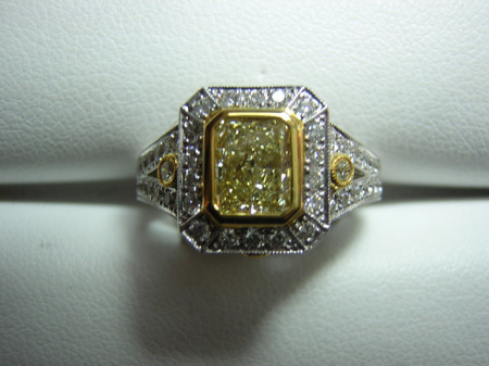 1.55ct. Yellow Diamond set in Platinum ladies ring