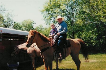Paul and Grandson on Paul's horse "Charlie: