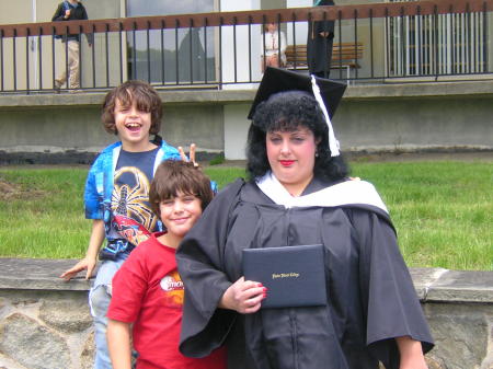 Graduating from RIC picture of my boys and me