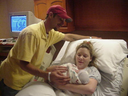 My sister, Cari, her husband Ronald, and 1st baby, Chase! '05