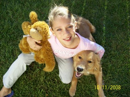 our daughter and Roxy(our new Golden)