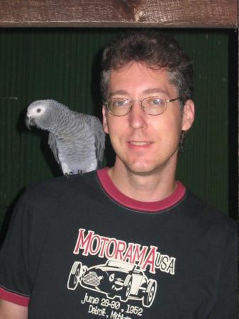 My husband Jeff and our parrot Gracie