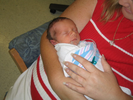Mommy holding a precious Miracle