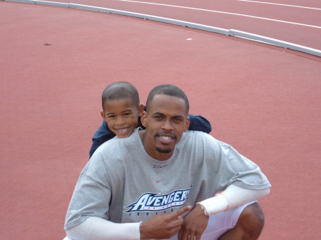 Stacey II at 7 with Uncle Lenzie after football practice in LA