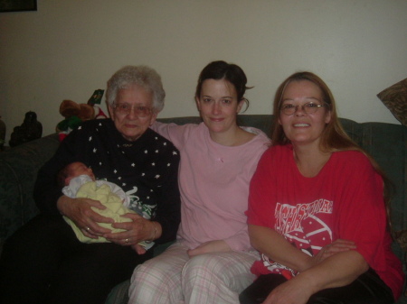 Mom holding Tommy, Carla and Me