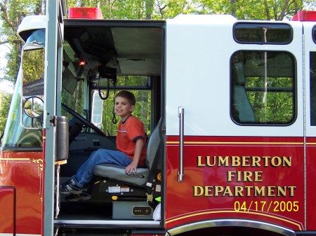 Tyler on the firetruck for his birthday!!