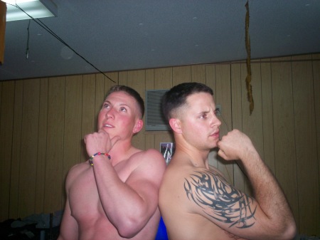 Zack (on left) posing with buddy in Iraq