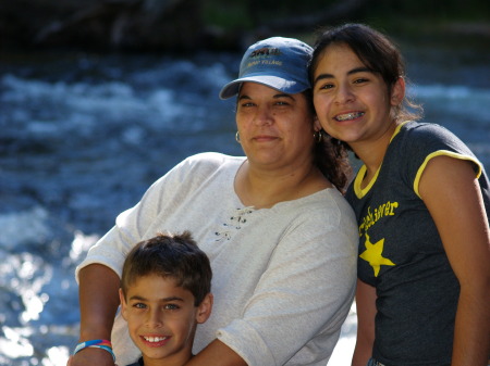 My wife Terry and our kids at Robinson Creek Bridgeport, CA. June 2006.