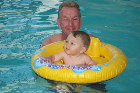 Our grandson Nathan's first swim.