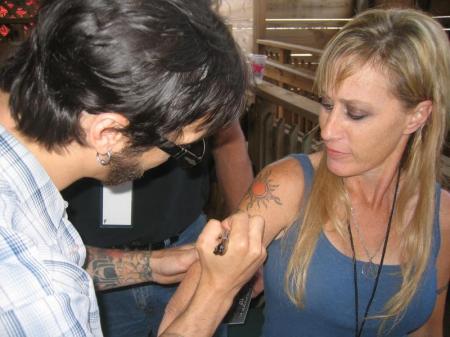 Sully from Godsmack signing my arm!