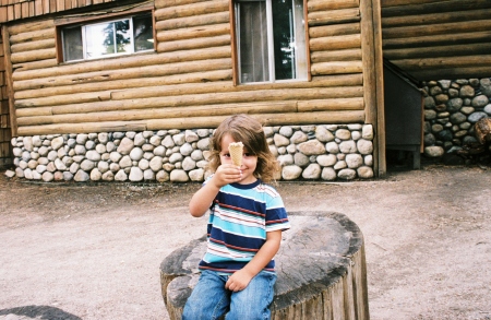 Ian at Devils Tower eating an ice cream after a hike!