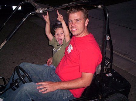 My son Spencer and me on his go-cart