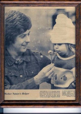 My daughter and I blowing Dandelions - 1973