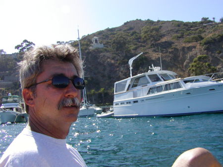 My Husband on the paddle boat in Catalina