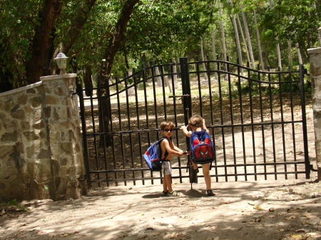 Sam and Will on the inside of the gate