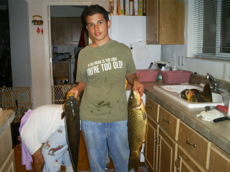 My son Michael and his fish.