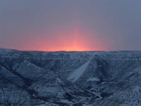 The sun sets in Parachute Colo