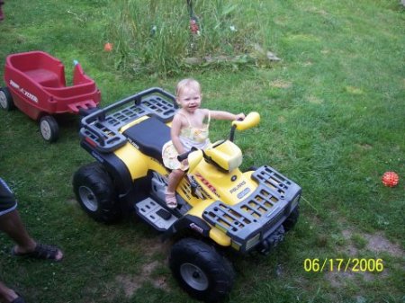 Serenity riding Trenton's 4-Wheeler