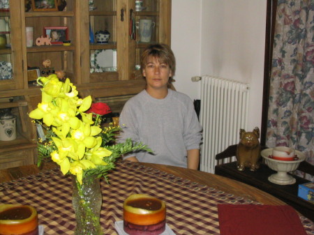 Shellie posing with flowers