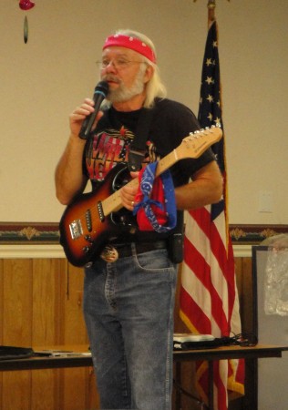 performing as "Willie Nelson"