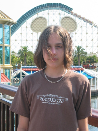 WOW! Doesn't my son look like we did in the 70's! I love it! Chad with Mickey Mouse ears in Disneyland. Summer 2006.The Happiest Place on Earth!