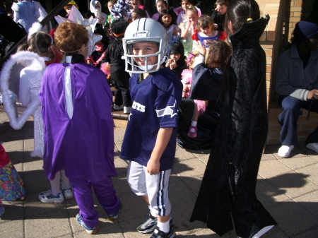 My son in his School Halloween Parade. That's not so scary!