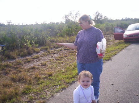 Me and my granddaughter feeding the Scrub Jay's