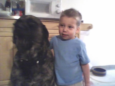 Our dog and Grandson