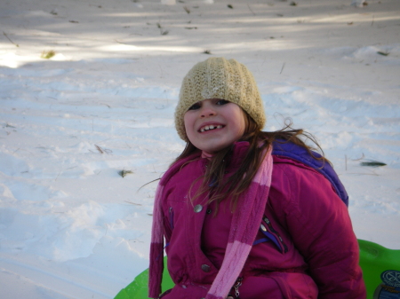 Heather sledding