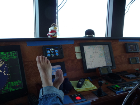 Feet up on the yacht Ingot