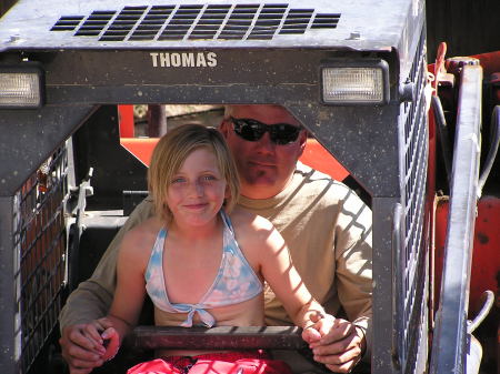 Haley and Daddy working on our backyard