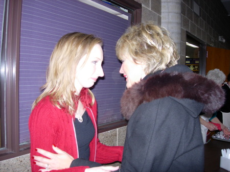 Melissa greeting Wendy at the funeral