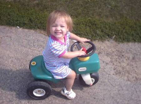 McKaylie on the Toy Tractor