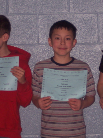 Alex gets the good citizenship award at school