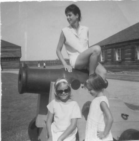 age 7 with sister and mom