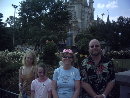 Howard Family in Front of Disney Castle