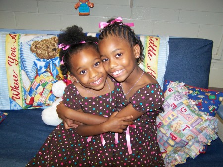 My girls sitting on my sofa in my classroom!