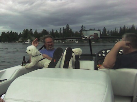 Steve & the pups enjoying a boat ride...