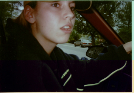 me at 17 in my crappy Ford Tempo