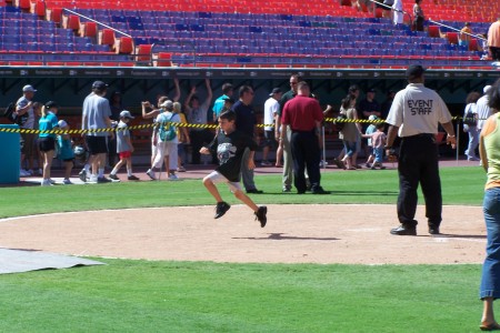 Zach running the bases at Dolphins stadium (Ma