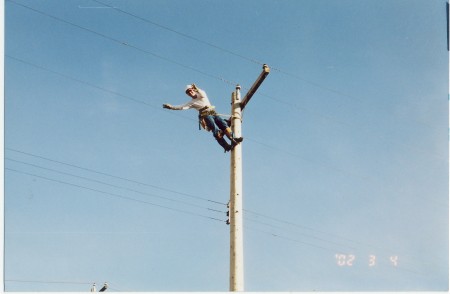 me hangin '10' off a power pole!