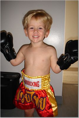 Nathan in boxing shorts