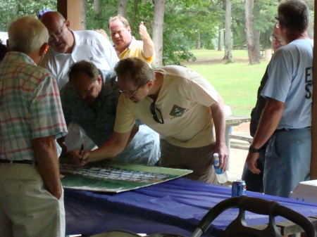 Signing the Football Pic