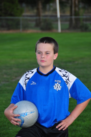 Nicholas in U11 Blue Lightening Uniform