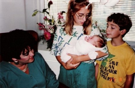 1989 - my big sister holding my little sister