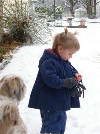 Lillie and our dog, Bandit in the snow