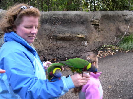 Liz KC zoo with niece, behind the bird