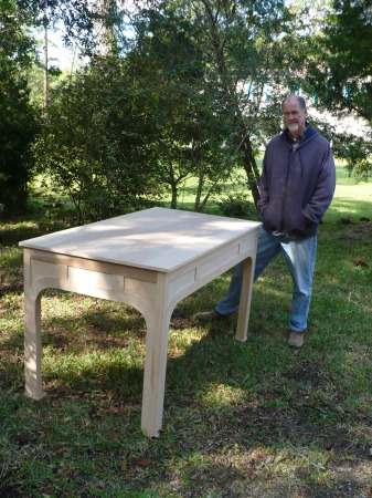 Hubby, John, with newly built table for Palm Harbour